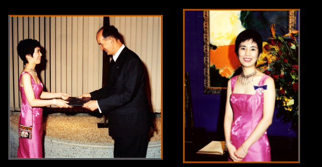 Two photographs of Yuuko Suzuki in a pink gown: receiving a presentation from a man in formal dress, and standing beside a floral arrangement